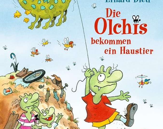 Die Olchis mit einem Drachen an der Leine.